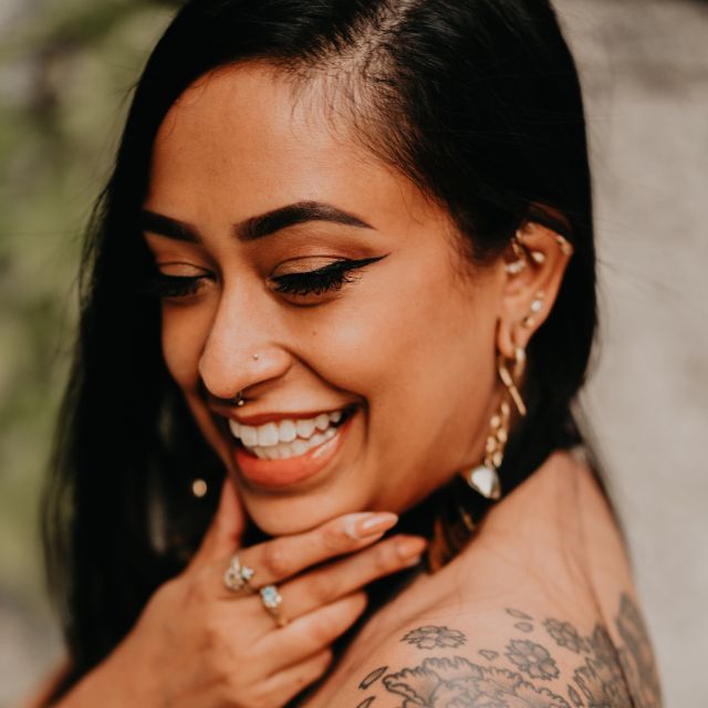 Rita Mookerjee (she/her)